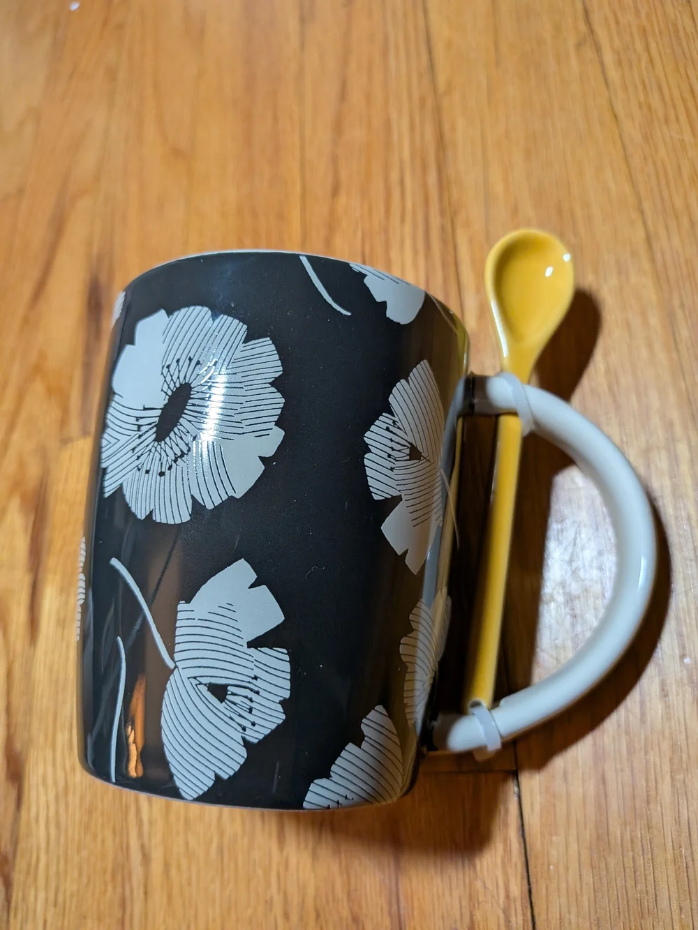 Tabitha Black Floral Ceramic Mug with Yellow Stirring Spoon